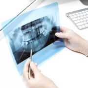 dentist-examines-x-ray-photo-teeths